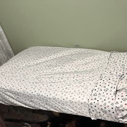 Twin size bed mattress and bedsheet