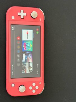 Nintendo Switch Lite in the Coral color. 125.00
