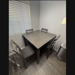 Bridson Counter Height Dining Table And 4 Bar Stools