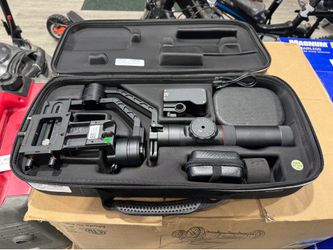 Zhiyun-Tech Crane-2 3-axis stabilizer kit, featuring a distinct metal gimbal body and a focus control wheel.