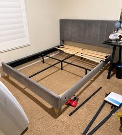 Queen sized bed frame with headboard