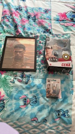 Signed framed John Cena photo from super con and 2 action figure collectibles not signed