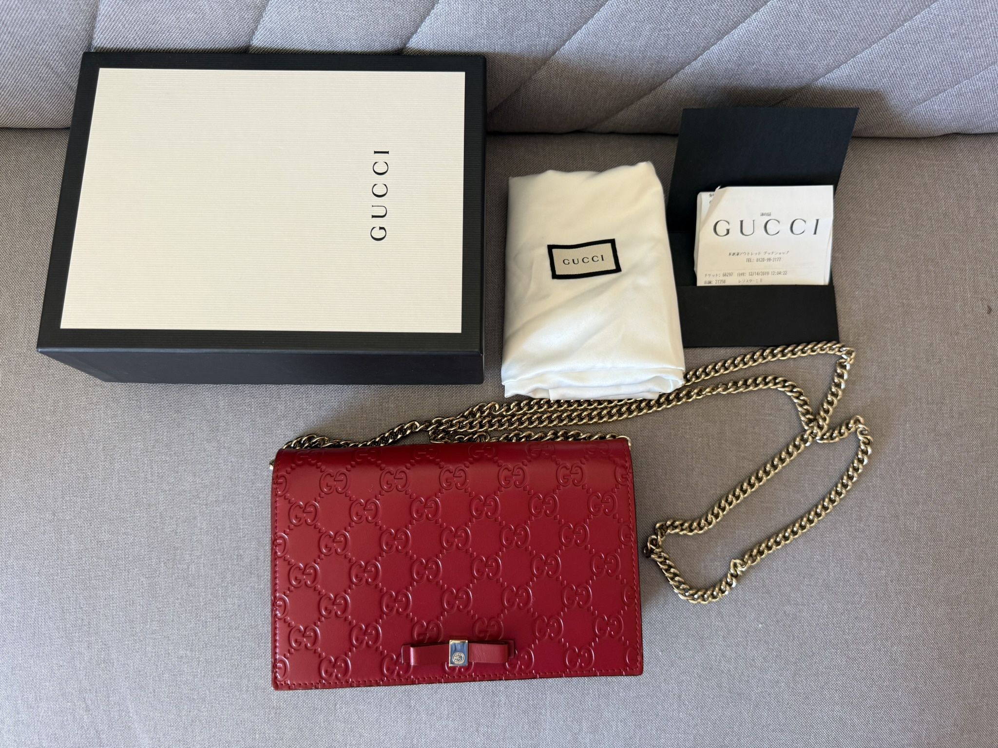 Authentic Gucci Guccissima Leather Signature Bow Mini Wallet on Chain – Hibiscus Red