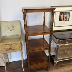 Vintage wood shelf/display piece on tiny castors