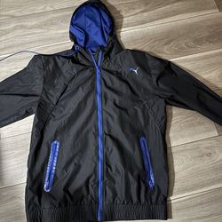 black and blue PUMA men's full-zip windbreaker jacket with a hood. Size M