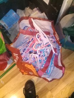 Multiple Hangers Mostly For Kids Clothes