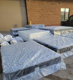 New Queen Mattress in plastic