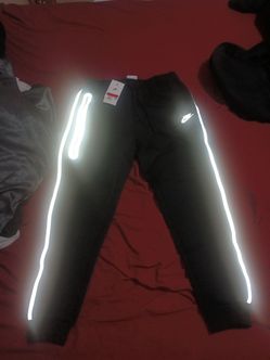 slim fit Nike reflective tech sweatpants size L