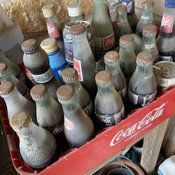 Coke bottles rare & misc bottle cases.