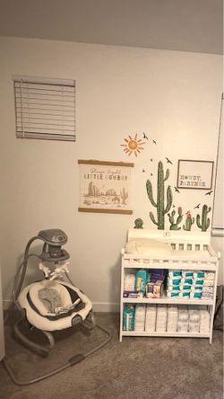 Changing station and swing