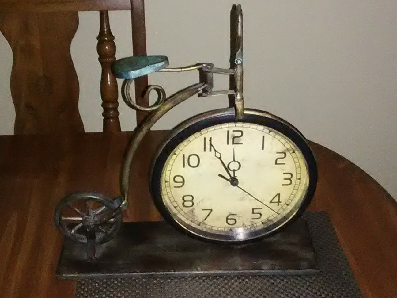 Antique bicycle clock