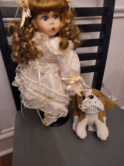 Porclein doll walking dog