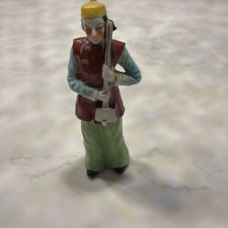 Vintage Japanese man holding an instrument