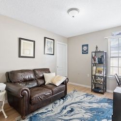 Brown Leather Love Seat - NIICE