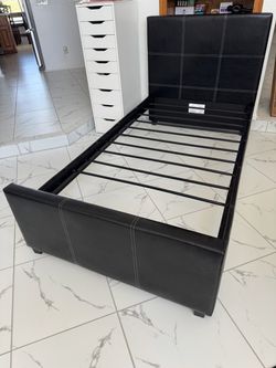 Twin bed frame with mattress