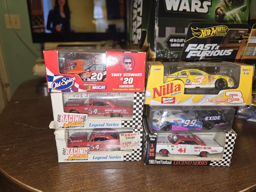 Lot of 8 1/64 scale diecast cars...Hotwheels...Nascar...Fast and the Furious