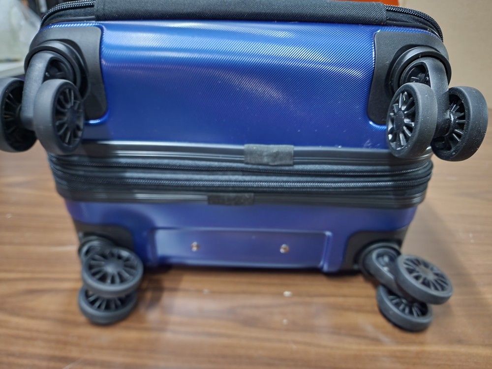 DELSEY Paris Titanium Hardside Expandable Luggage with Spinner Wheels, Midnight Blue, Carry-On 19 In