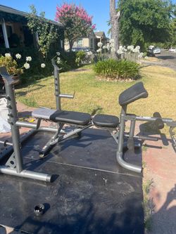 Olympic rack with multiple position bench