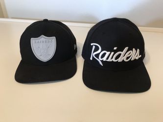 New Era 9FIFTY Raiders Cursive Logo Snapback & New Era 9FIFTY Raiders Silver Reflective Shield Snapback