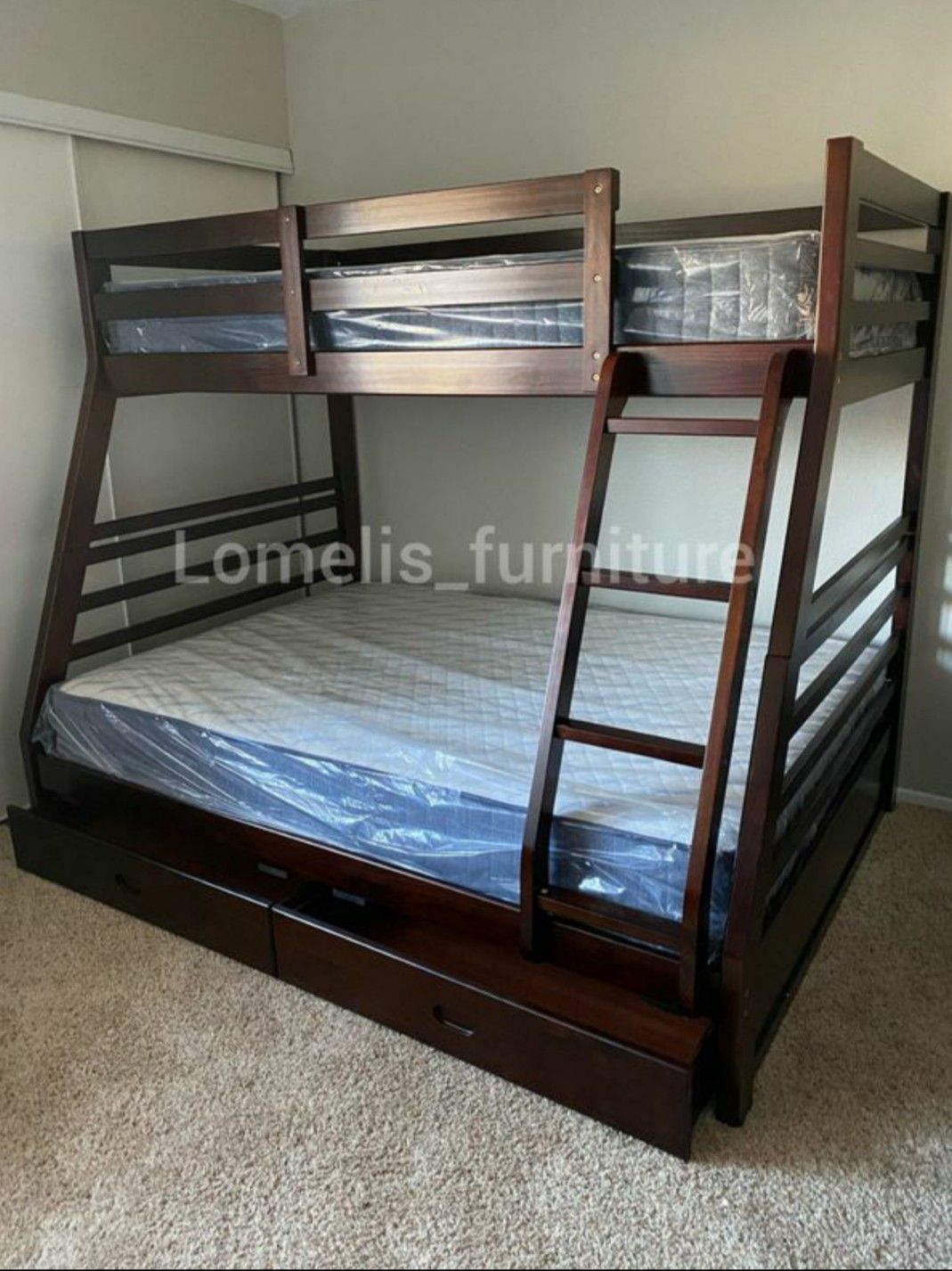 TWIN/FULL BUNK BEDS W MATTRESSES INCLUDED.
