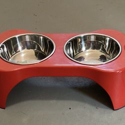 Pet food bowls, stainless steel in red stand