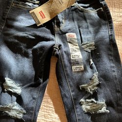 Women’s 710 Super Skinny Distressed Jeans