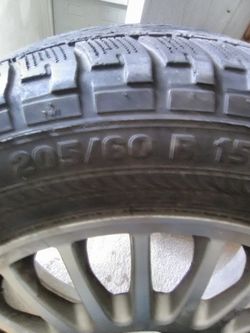 $70 for 2 used tires with rim size 205 60 15