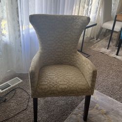 Beige Armchair With A Gold Design