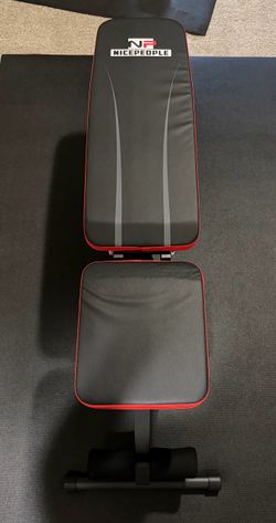Gym bench with 35lb dumbbells