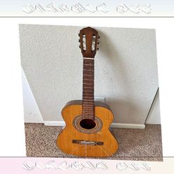 Acoustic Guitar Beautiful Music and Expert Craftsmanship increase poor
