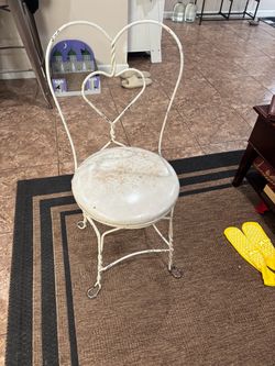 Vintage heart back wrought iron chair