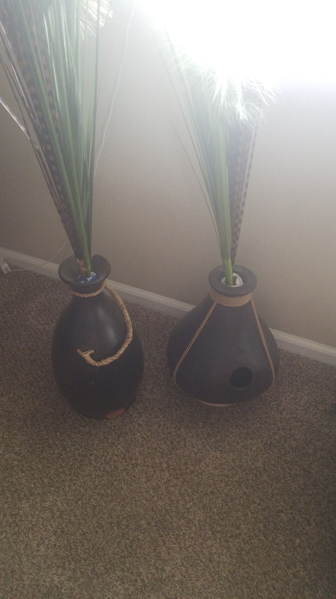 Decrotive jugs with fake plants