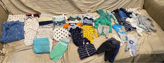 Boy’s assorted baby clothes NB