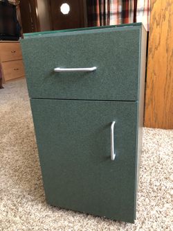Side of couch remote and other storage cabinet