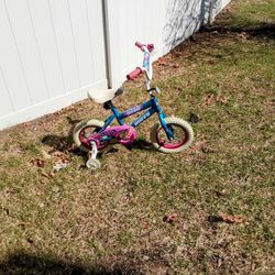 Girls Huffy Bicycle With Training Wheels New Condition