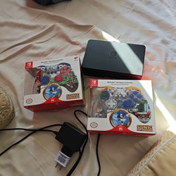 Nintendo switch console with two controllers