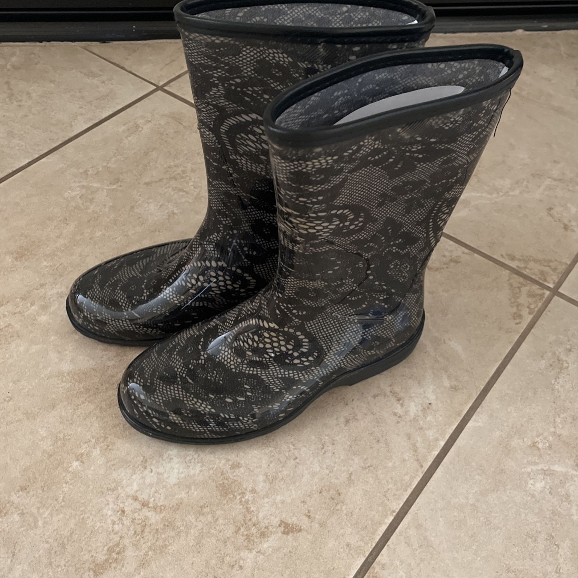 Black and gray Rain boots