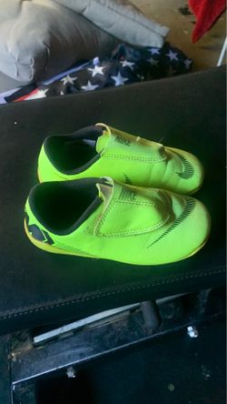 Nike kids neon soccer cleats. 9c