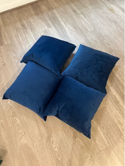 large blue velvet/suede pillows