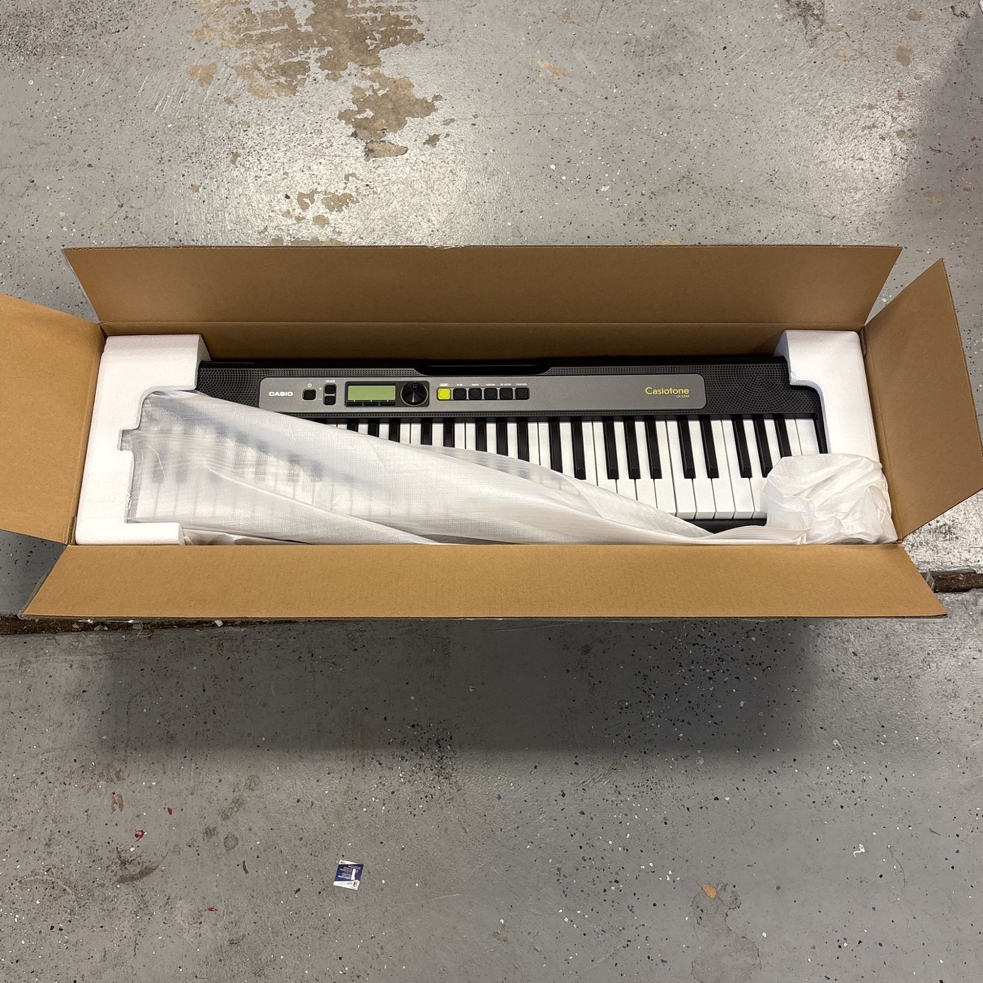 Casio Casiotone LK-S245 Keyboard with 61 Key Includes Stand, Power Cord & Pedal