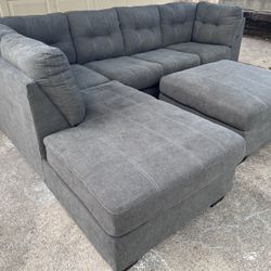 *New condition*Sectional Sofa by Ashley Furniture & Ottoman 