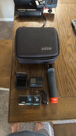GoPro HERO11 Black Bundle – 3 Batteries + Charger + Grip + Case