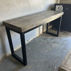Table With Black Metal Stand Legs 