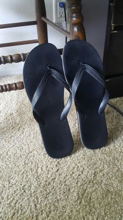 A black mens flip flops