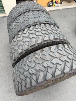 (4) 37x12.50R18 Nitto Trail Grappler M/T Tires