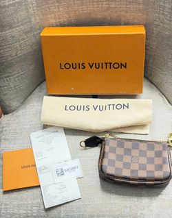 LV Mini Pochette Accessoires (used)