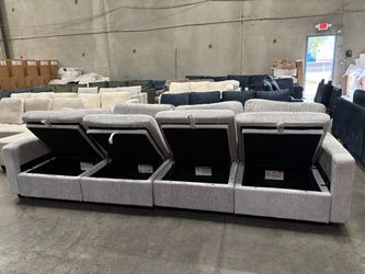 Light grey deeper seat couch with storage