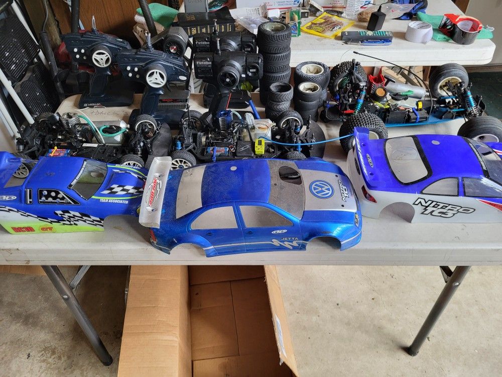 3 Remote Control Fuel Powered Cars. 5 Controllers And Extra Wheels Untested Selling As Parts