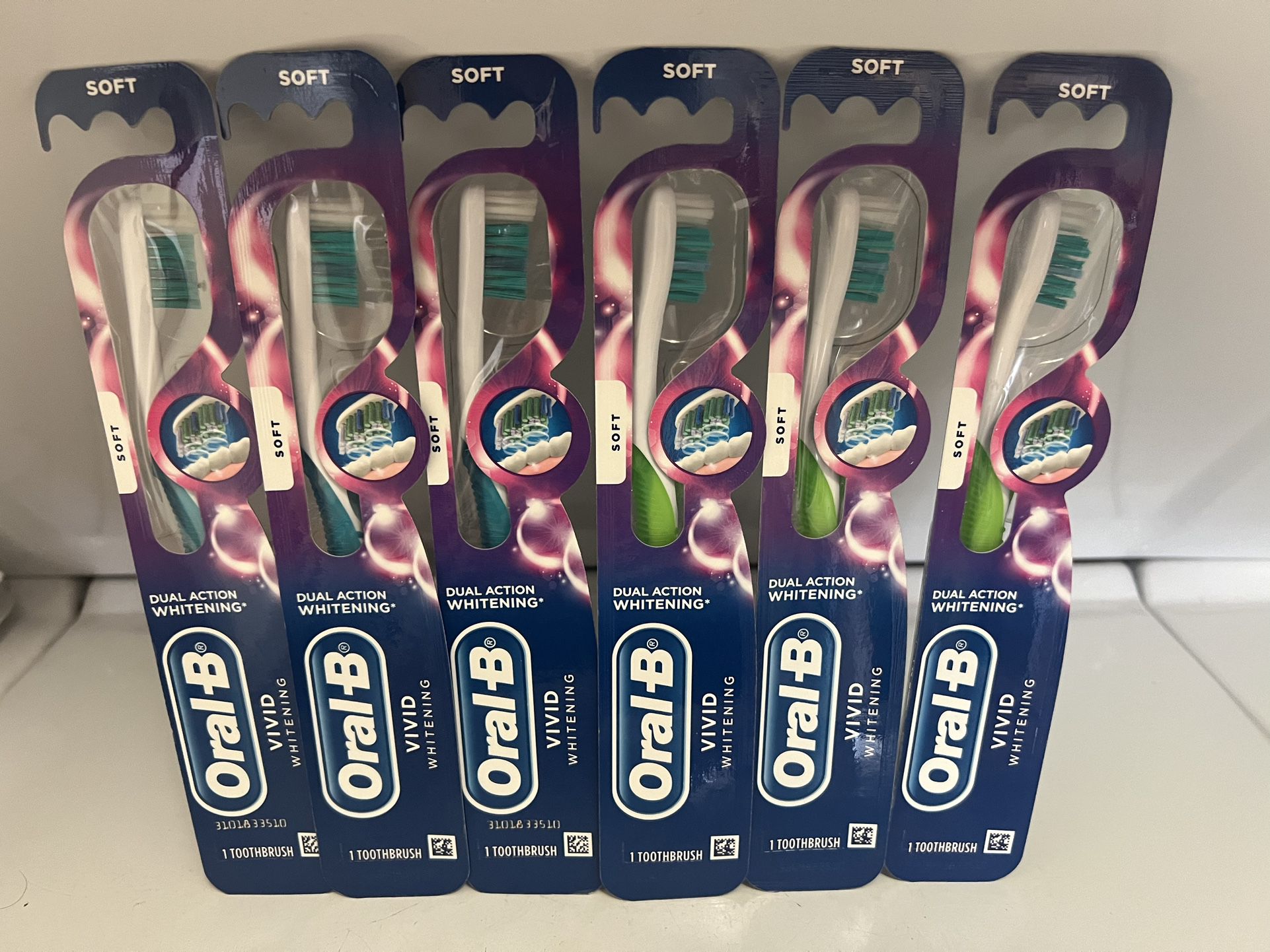 Oral B Vivid toothbrush Soft all 6 for $12