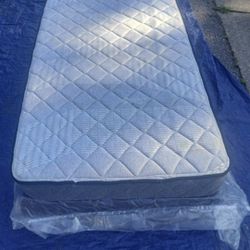 SEALY TWIN MATTRESS AND BOX SPRING( Still In Plastic)